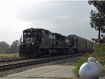 NS 8585 leads a northbound train at Pomona tower